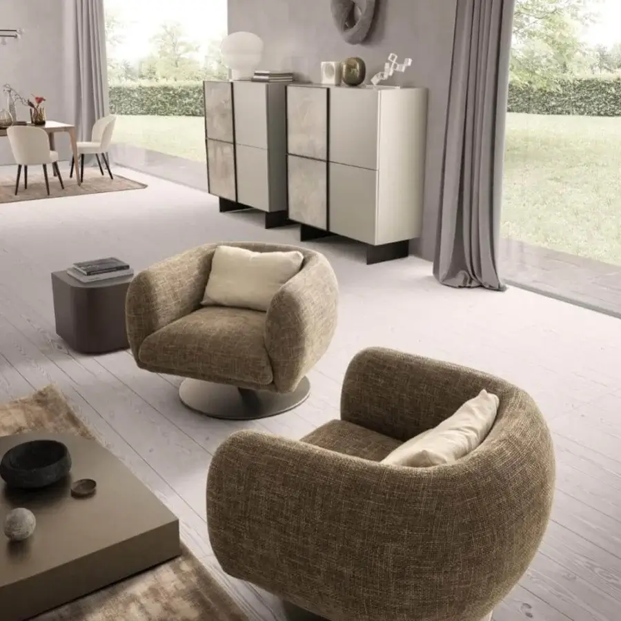 Superior Presotto Bali lounge chair upholstered in textured brown textile with a Peltro painted base and off-white cushion