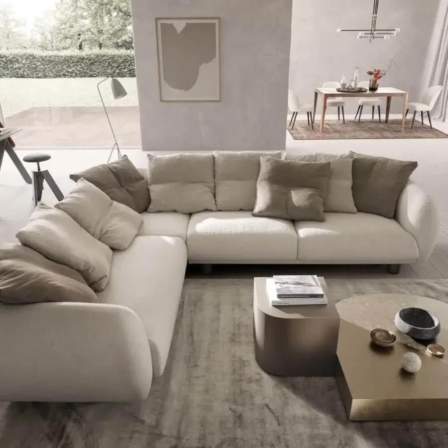 Exceptional Presotto Bali sectional with sinuous design, light beige textile upholstery and refined Peltro painted legs