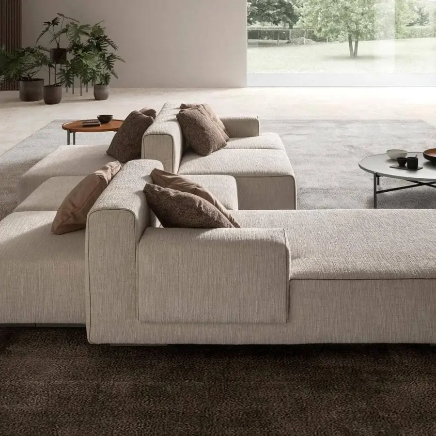 Exceptional Presotto Leros sectional with light beige textile upholstery, wide armrests and peltro varnished metal feet