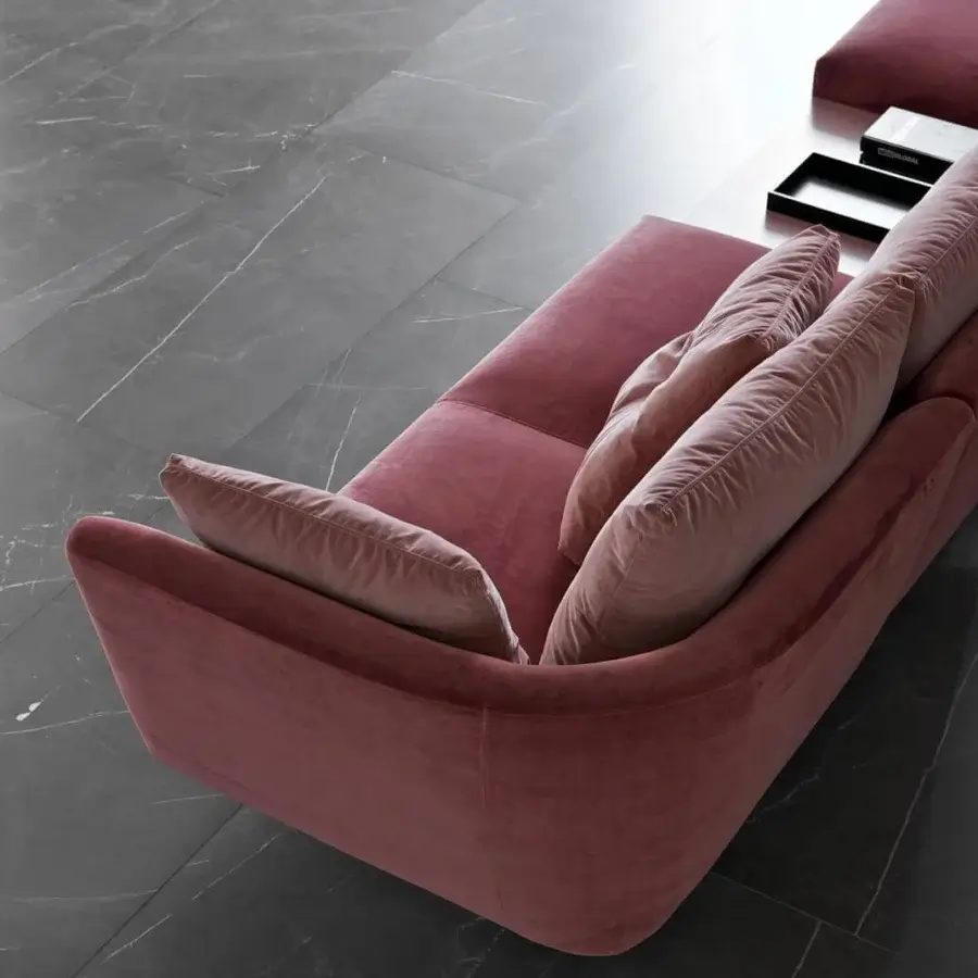 Elegant Presotto Saint Barth sectional with curved form, rose textile upholstery and refined Peltro base