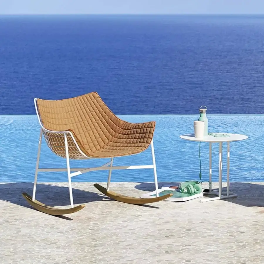 Refined Varaschin Summer Set rocking lounge chair with white powder-coated steel frame and brownish-tan quilted textile cushions