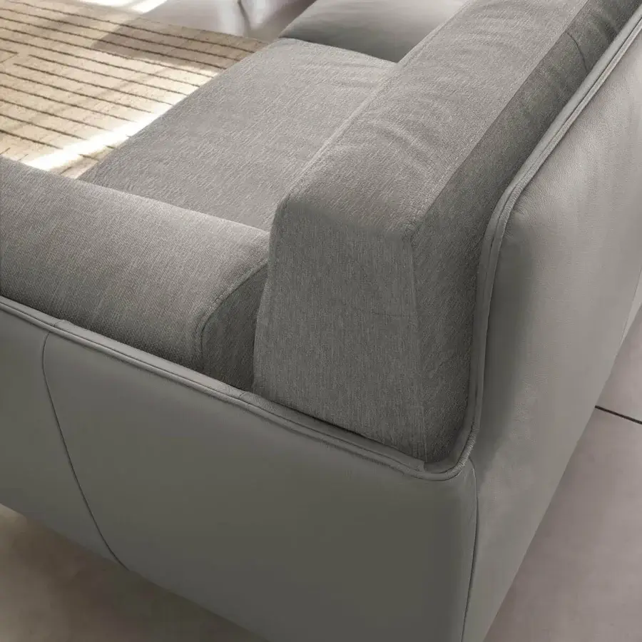 Elegant Ditre Italia Kris sectional with matte gray textile cushions and sleek gray synthetic leather base