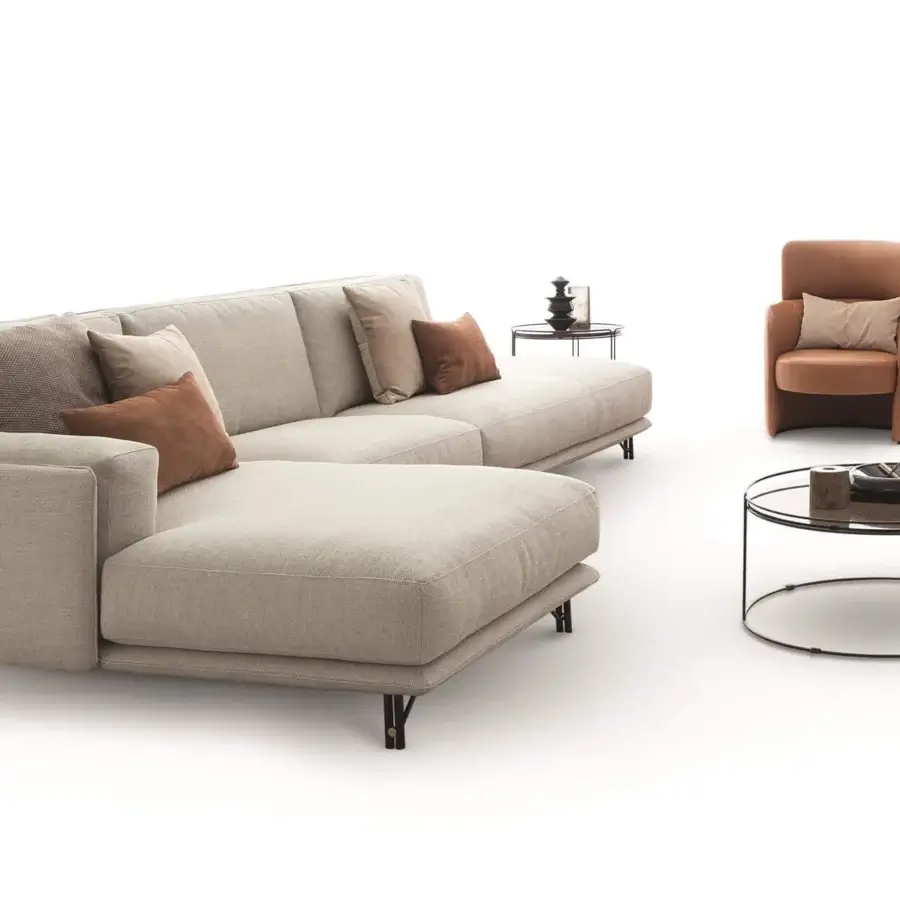 Captivating Ditre Italia Kris sectional in light beige fabric accented with curated brown and beige cushions and stylish metal feet