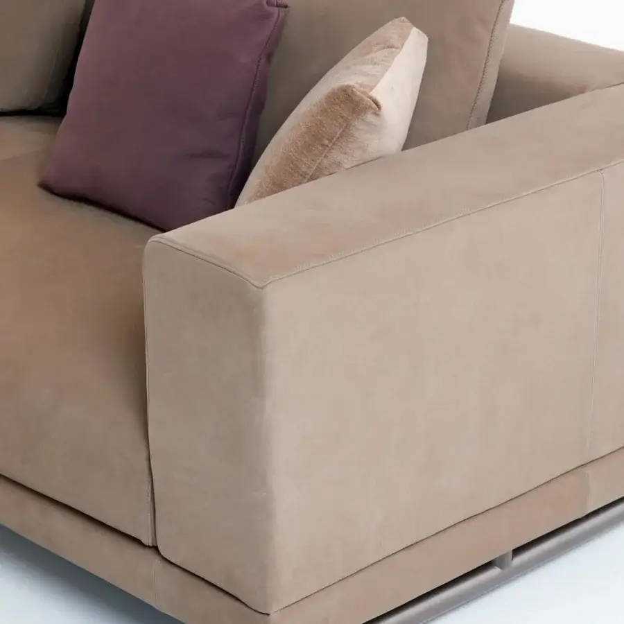 Exceptional Presotto San Marino sectional upholstered in smooth matte beige textile with peltro varnished metal legs and dark brown pillows