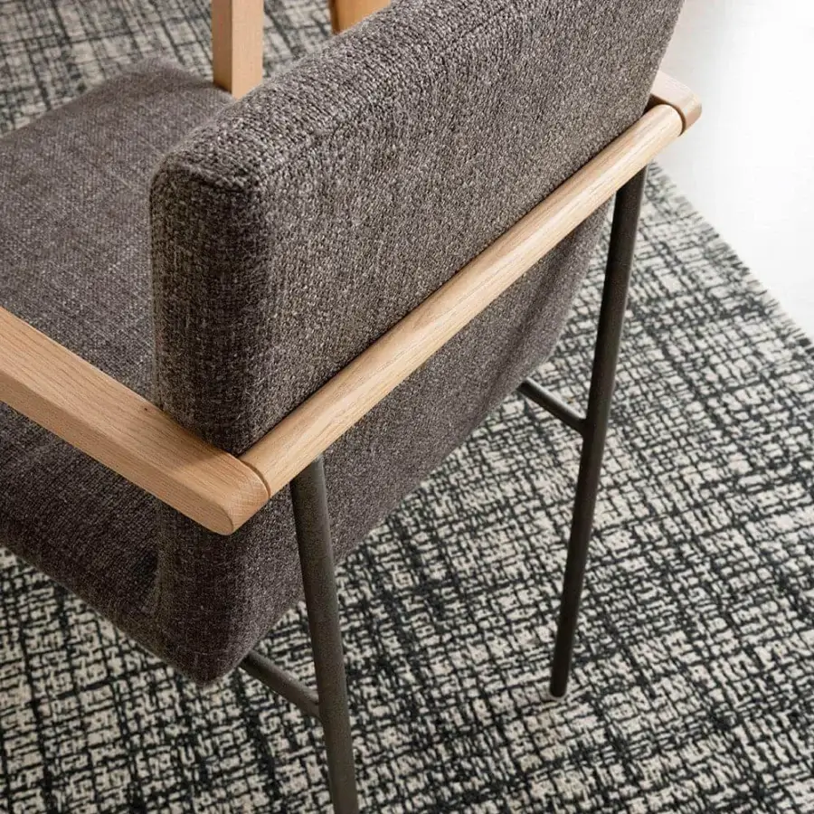 Elegant Presotto Vega armchair with textured gray textile upholstery and light walnut wood with dark metal legs