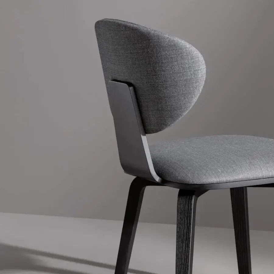 Elegant Bonaldo Olos chair with balanced design, woven gray fabric upholstery and coal ash wood frame