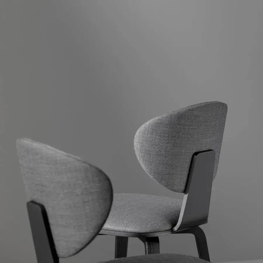 Harmonious Bonaldo Olos chair with sinuous form, woven gray fabric upholstery and coal ash wood legs