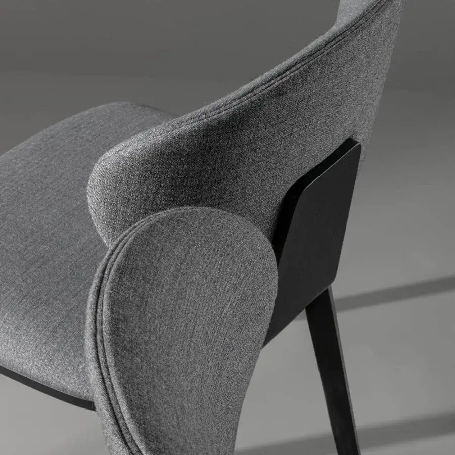 Distinguished Bonaldo Olos chair with soft gray textile upholstery and coal ash wood legs and backrest