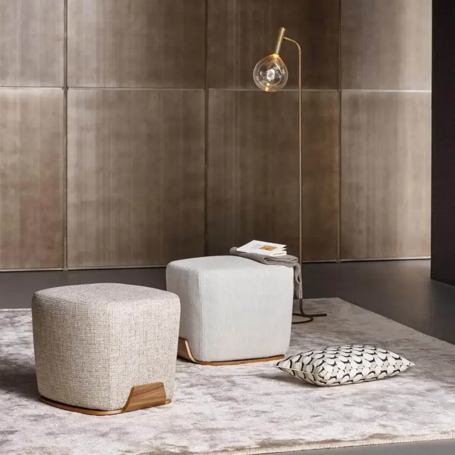Distinguished Bonaldo Olos ottoman with curved Canaletto Walnut base upholstered in textured light beige fabric