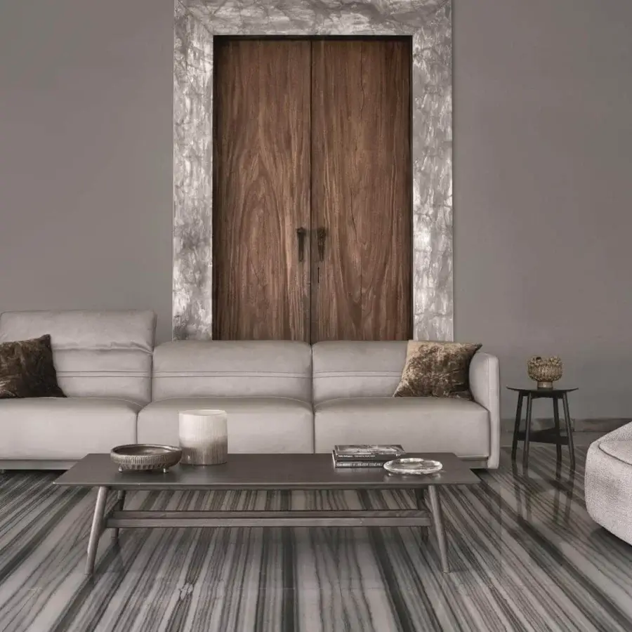 Refined Ditre Italia Arlott sofa with light grey matte textile upholstery and brown velvet-like pillows