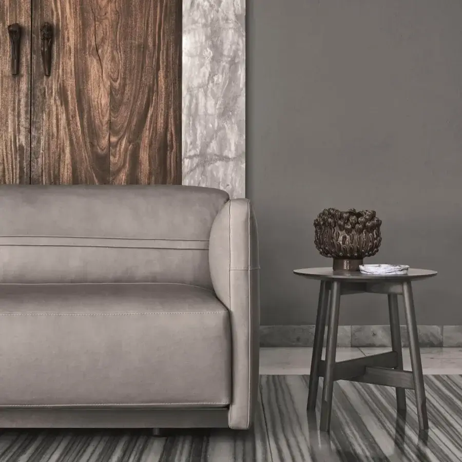 Elegant Ditre Italia Arlott sofa with adjustable backrest and smooth grey material upholstery embodying a modern aesthetic
