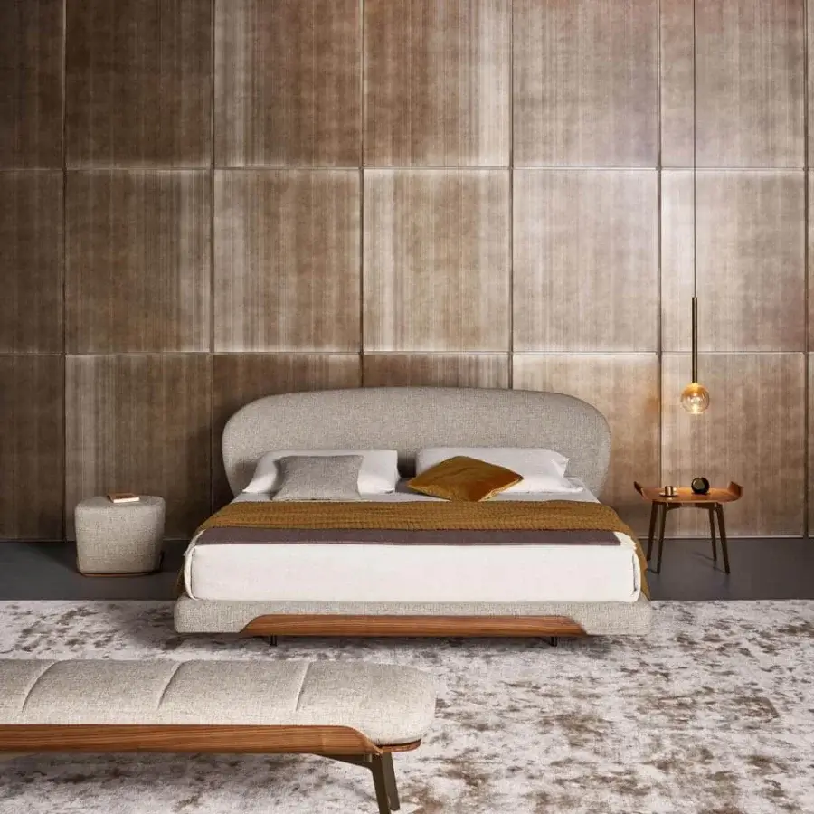 Elegant Bonaldo Olos bed crafted in light gray textile upholstery with curved Canaletto Walnut wood and matt varnished metal feet