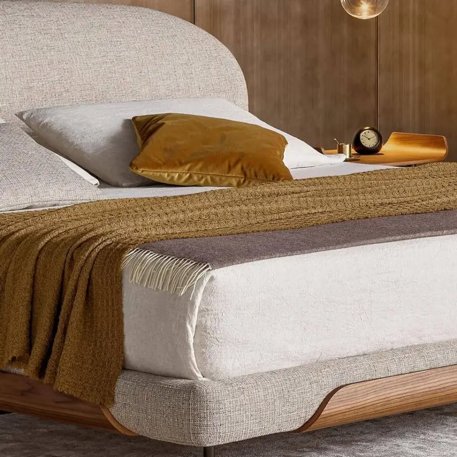 Exceptional Bonaldo Olos bed with enveloping headboard and curved frame in light beige woven textile with Canaletto Walnut detailing