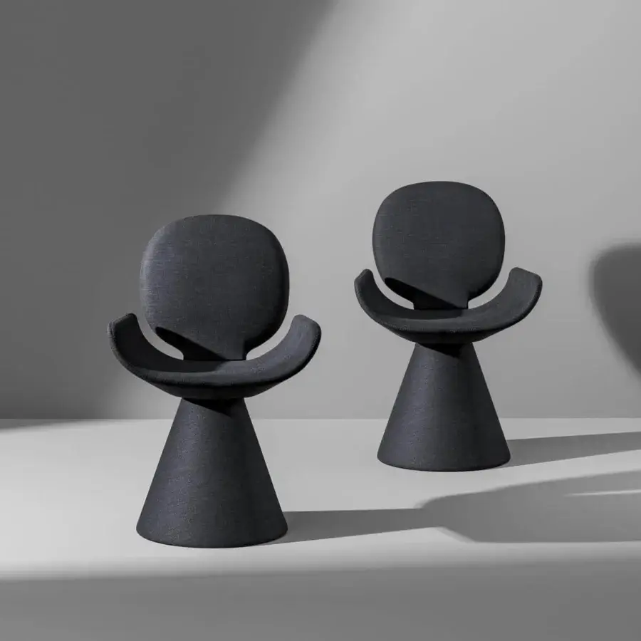 Harmonious Bonaldo Youpi armchair upholstered in matte dark gray textile with a flared conical base