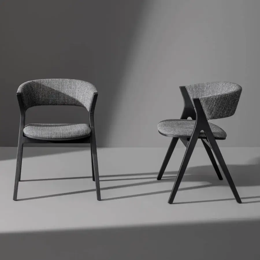 Exceptional Bonaldo Remo chair with a welcoming curved back built in textured gray fabric and dark coal finished ash wood legs