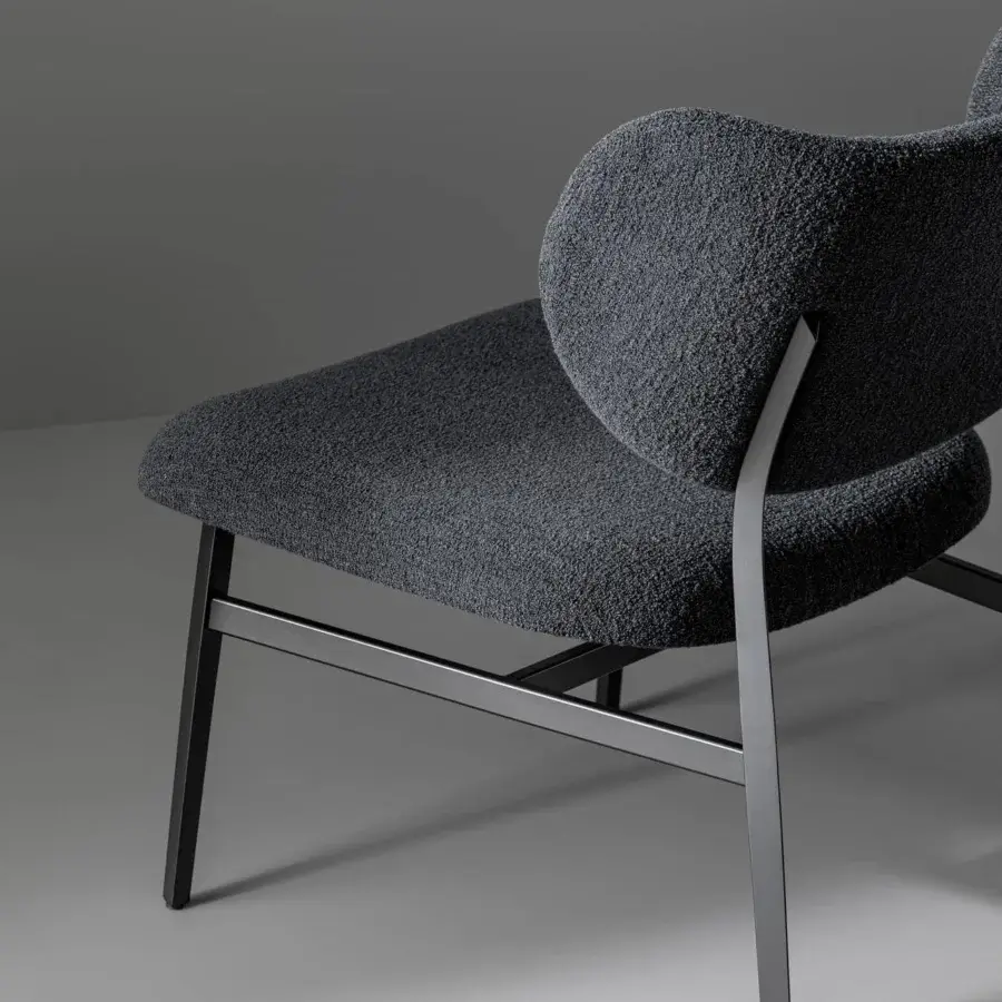 Distinguished Bonaldo Noor lounge chair with dark gray textured textile upholstery and matte finished metal frame