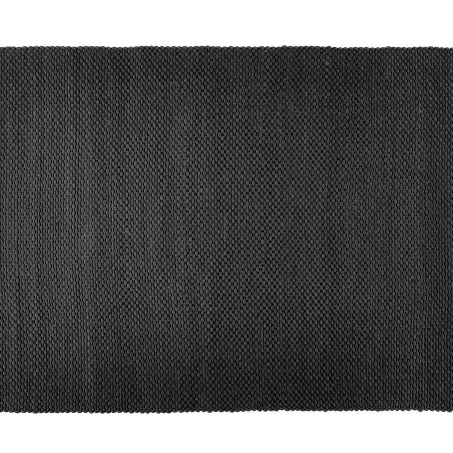 Distinguished Bonaldo Dakar rug crafted in Italy with 50% wool and 50% polyester exhibiting a raised nubby texture