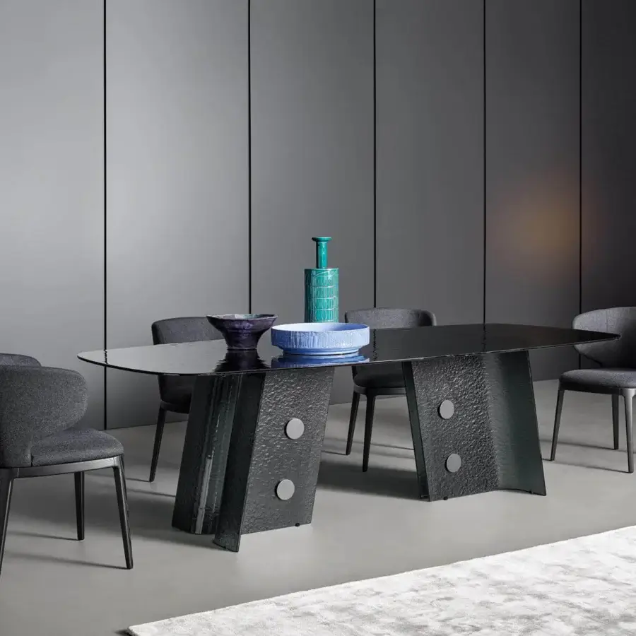 Superior Bonaldo Botón table with organically shaped smoked tempered cast glass top and textured lead plus metal base
