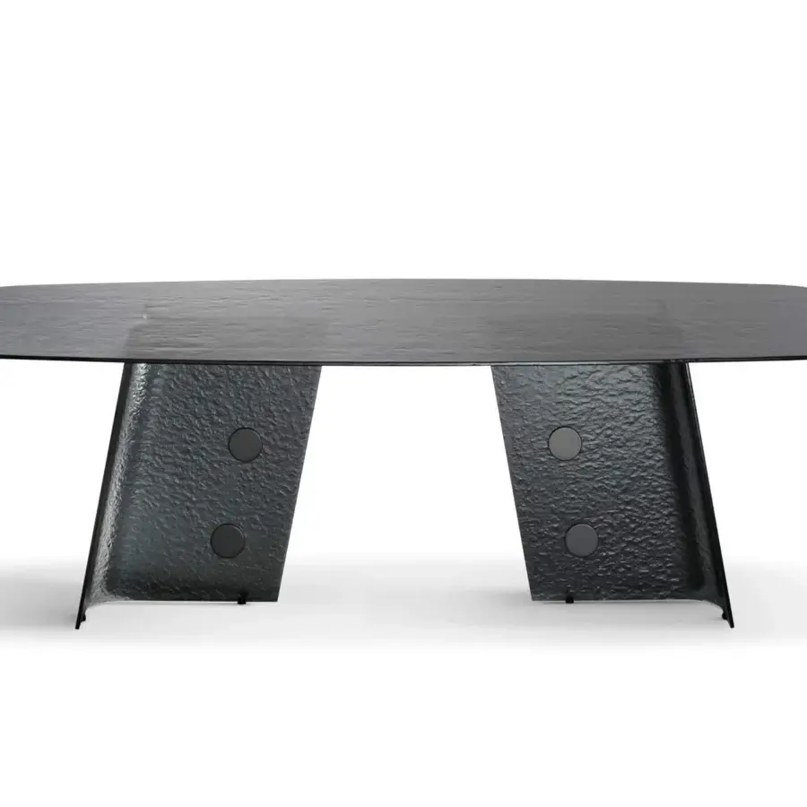 Distinguished Bonaldo Botón table with rounded rectangular smoked tempered cast glass top and geometrically shaped pedestal base crafted with a textured finish