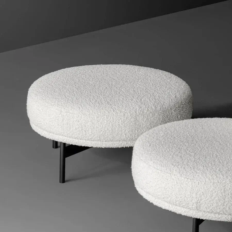 Superior Bonaldo Neuilly ottoman with textured off-white upholstery and slender matte black metal base
