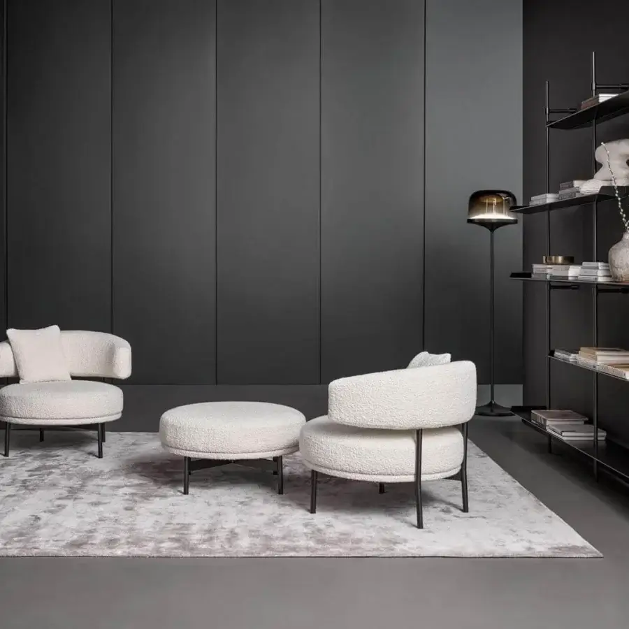 Exclusive Bonaldo Neuilly ottoman with textured light off-white fireproof fabric and slender dark tubular metal base