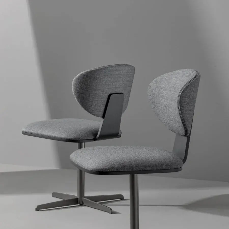 Elegant Bonaldo Olos chair with textured gray fabric upholstery and coal ash wooden lower backrest in dark gray metal finish