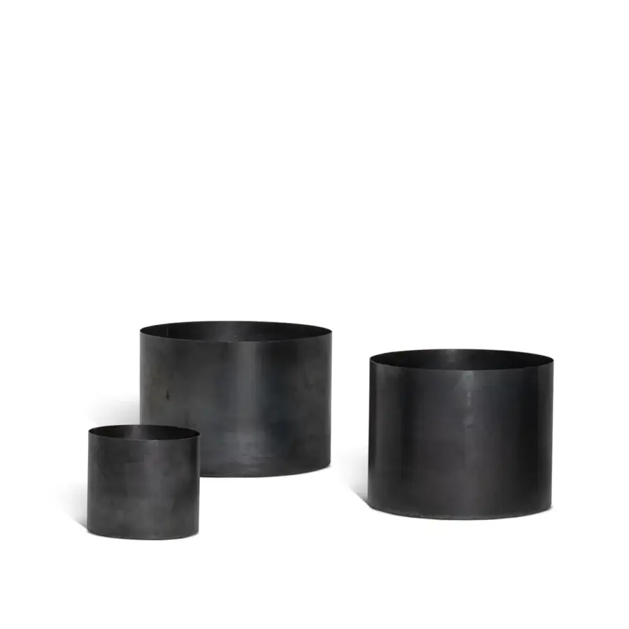 Refined Bonaldo Metal Planter accent crafted in matte black metal with a cylindrical structure