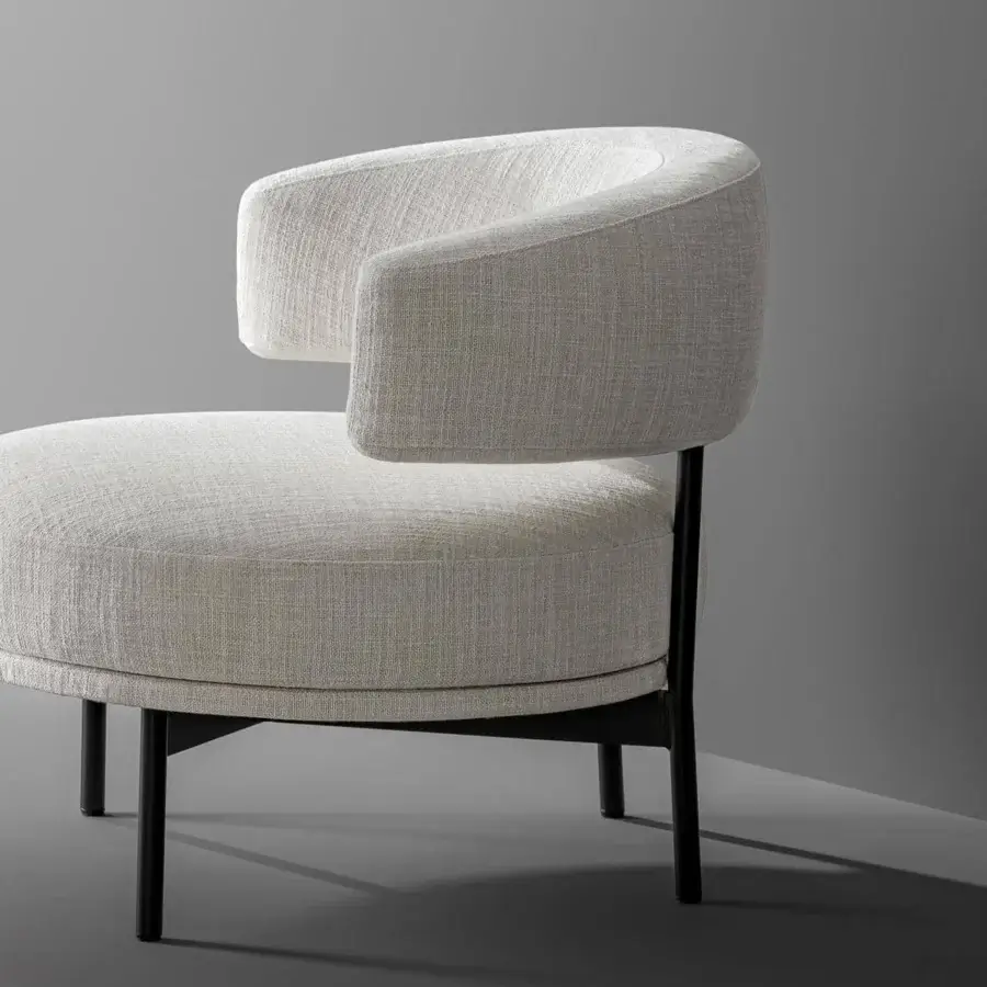 Distinguished Bonaldo Neuilly lounge chair with light beige woven fabric upholstery and a slender dark metal frame