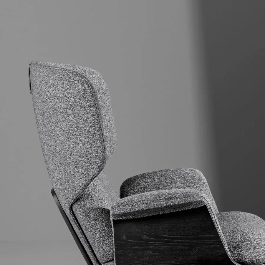 Distinguished Bonaldo Olos lounge chair with a curved coal oak structure upholstered in light gray textured textile and matt painted metal base