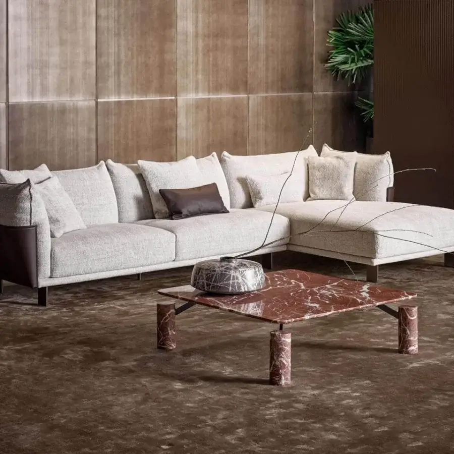 Captivating Bonaldo Magic coffee table with red and white marble and cylindrical legs creating a suspended appearance