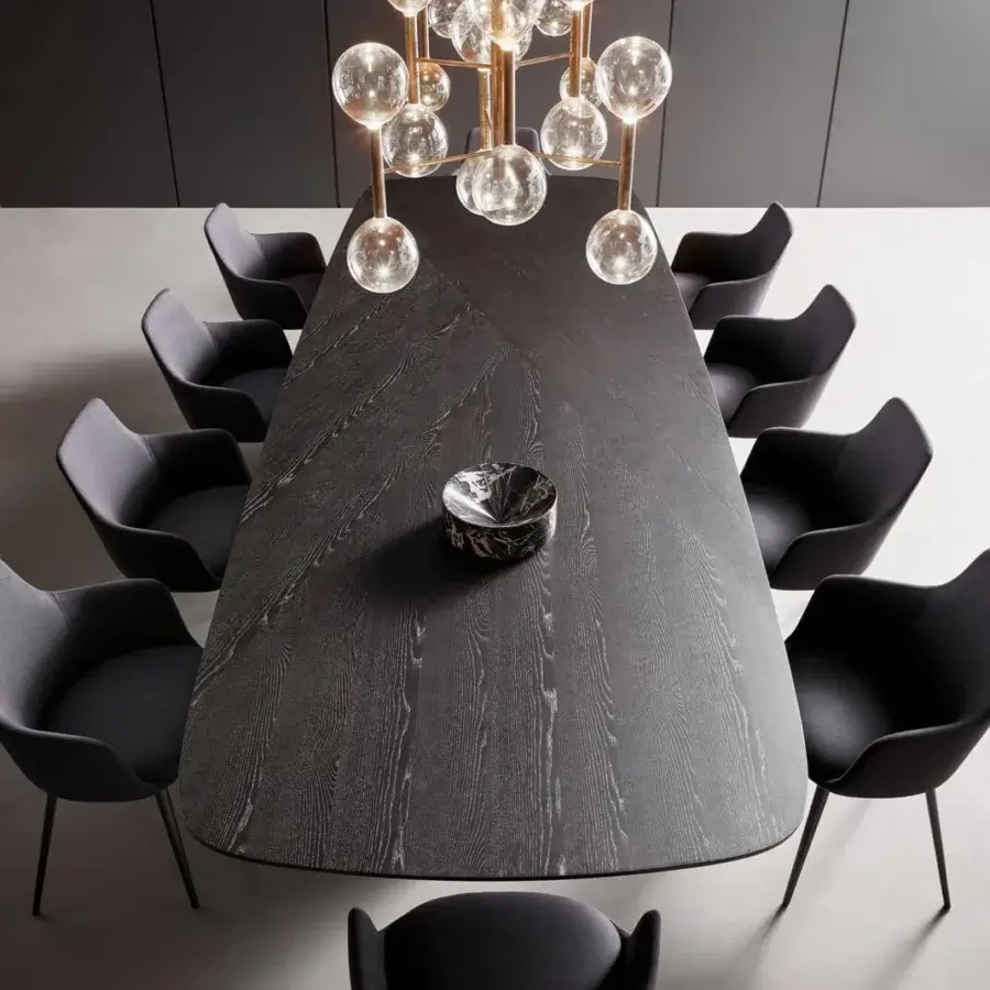 Exceptional Bonaldo Mellow 400 table crafted in Canaletto Walnut veneered wood with a chevron grain and sculptural base