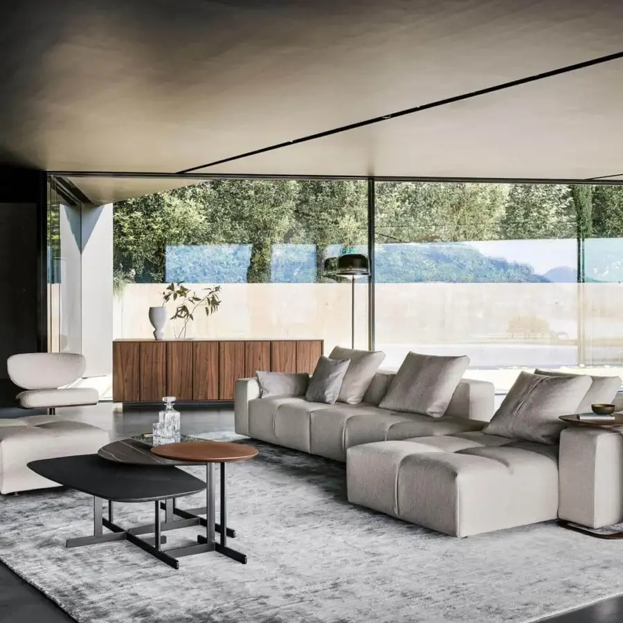 Harmonious Bonaldo Bonamour sectional with light gray textile upholstery and black matt varnished metal feet
