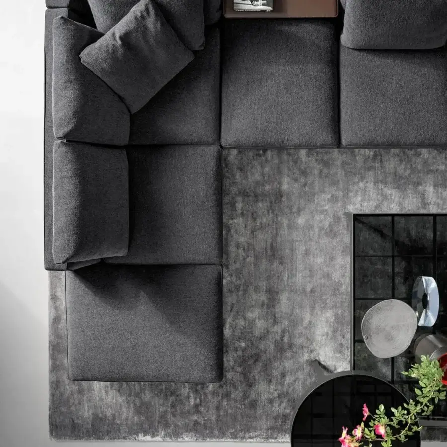 Distinguished Bonaldo Phil sectional upholstered in dark gray textile with a matte finish and perimeter base