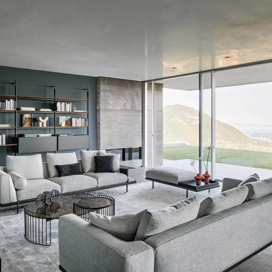 Captivating Bonaldo Phil sectional with light gray textured textile and matt varnished metal perimeter base
