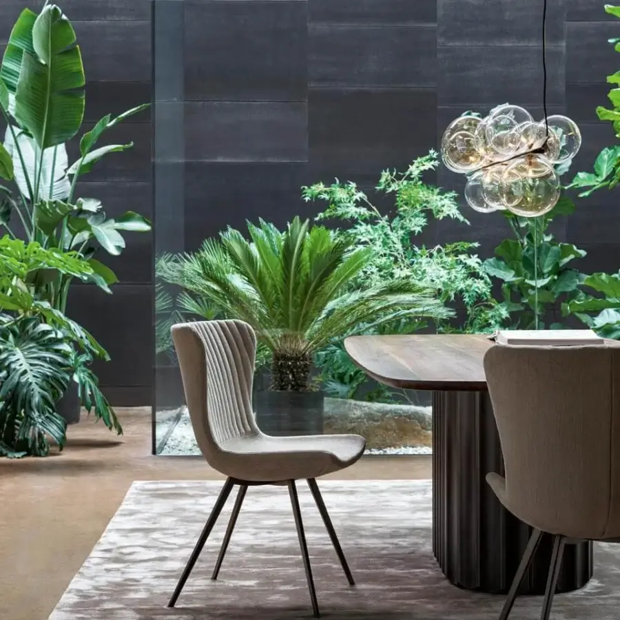 Exceptional Bonaldo Colibrì chair crafted in Italy with muted beige textile upholstery and refined parallel stitching
