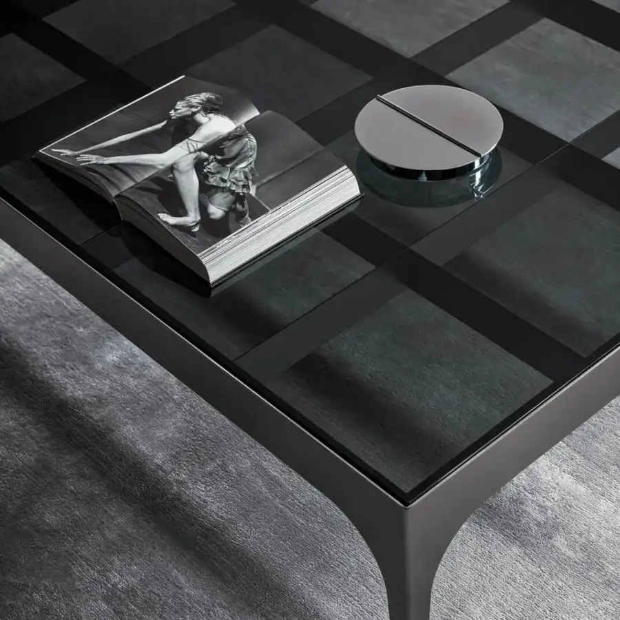 Distinguished Bonaldo Passy coffee table with bronzed glass top and dark metal chessboard base supported by curved legs