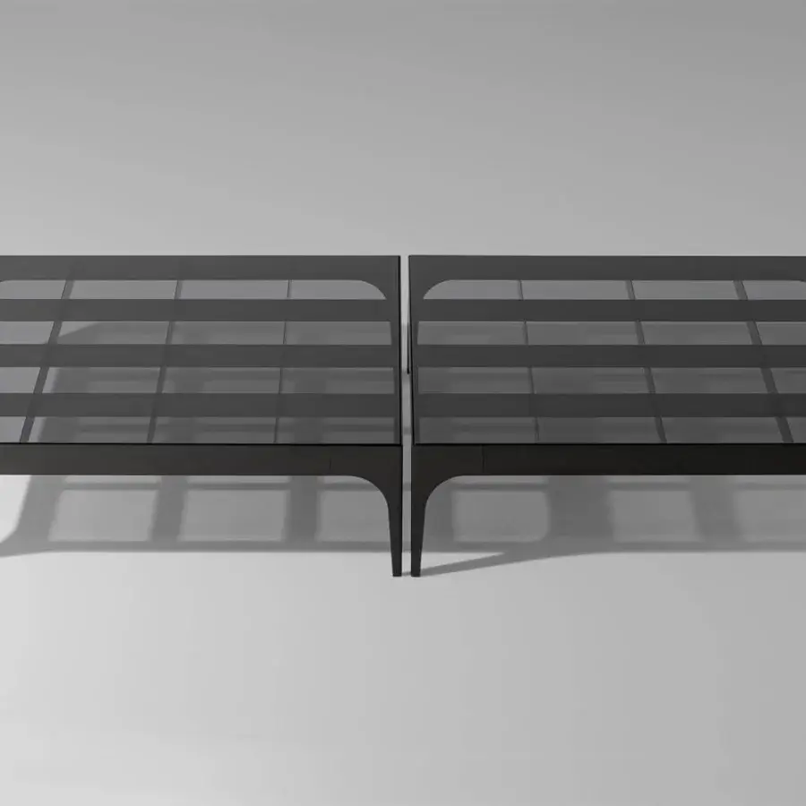 Elegant Bonaldo Passy coffee table with smoked glass top and dark lead metal chessboard base