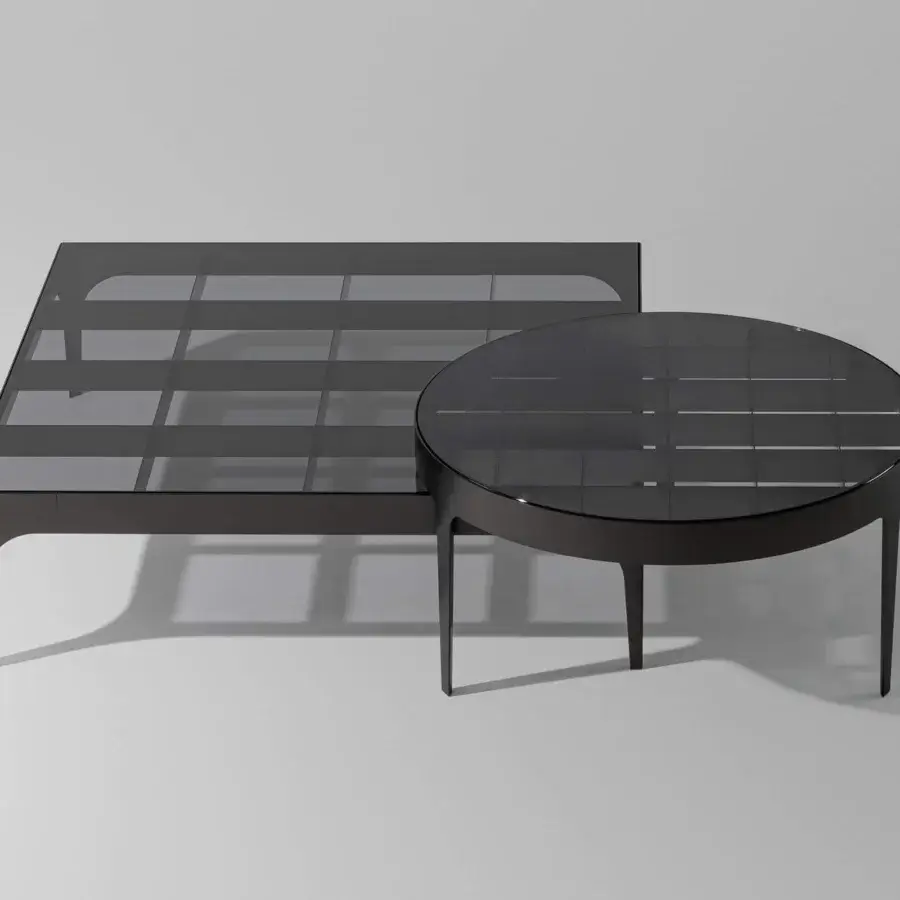 Superior Bonaldo Passy coffee table with smoked glass top and lead plus metal base exhibiting linear grid detail