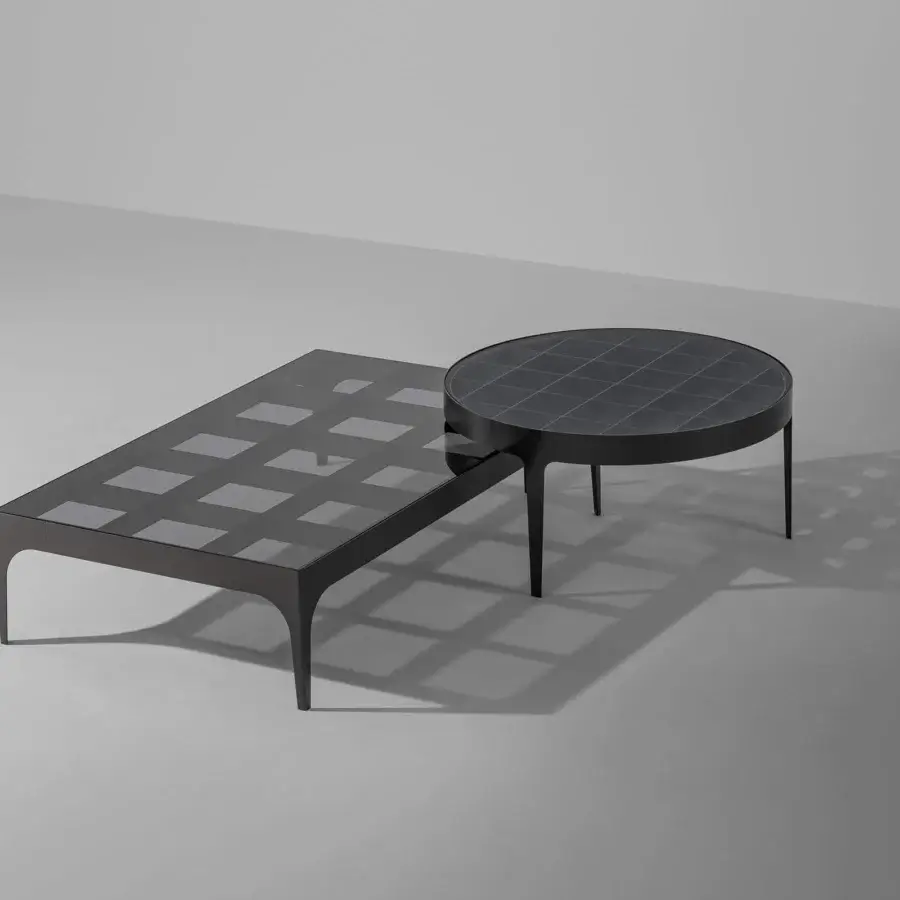 Captivating Bonaldo Passy coffee table with a smoked glass top and striking lead plus metal chessboard base