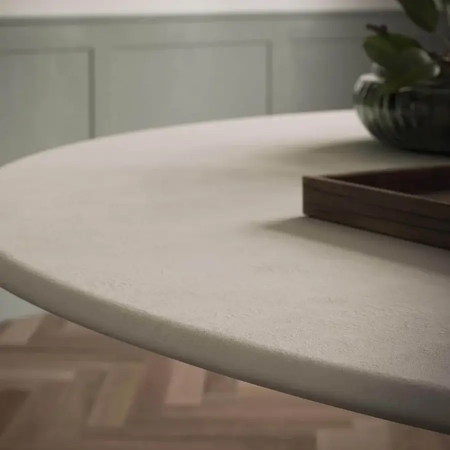 Distinguished Cattelan Italia Giano table with round top in clay and subtly textured spatulate finish presents a light beige hue