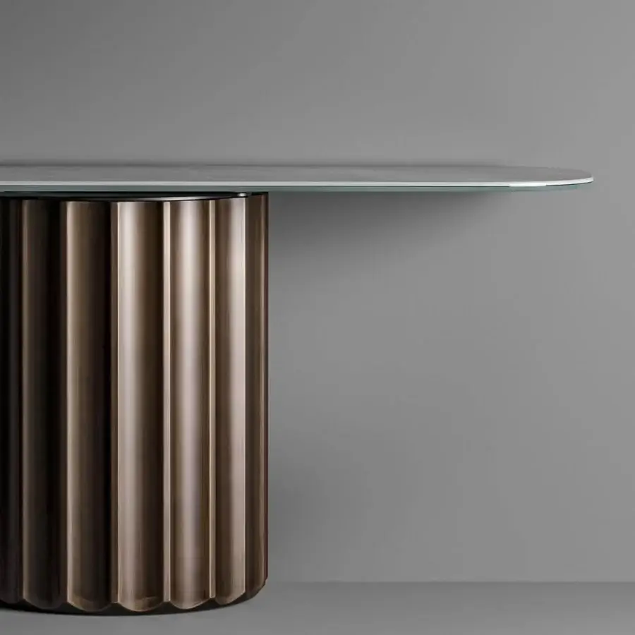Exceptional Bonaldo Dorian console crafted in Italy with a brushed finish and grooved base in bronze tone glass