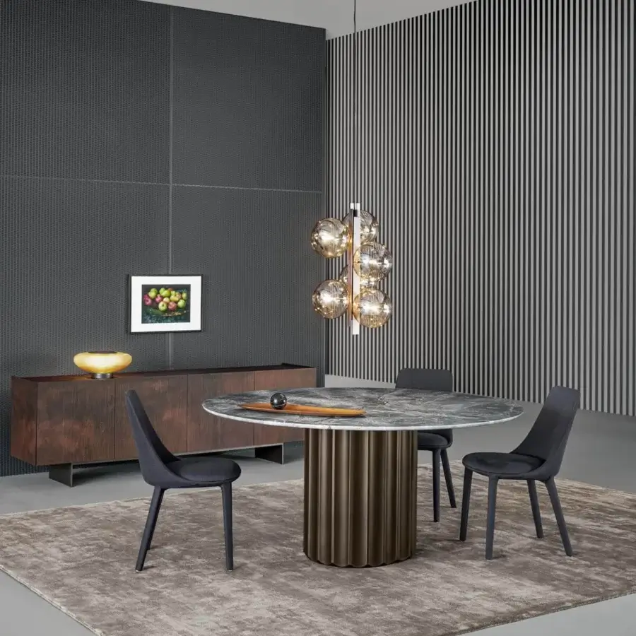 Elegant Bonaldo Dorian table with grey ceramic top and bronze metal base crafted in a ridged cylindrical form