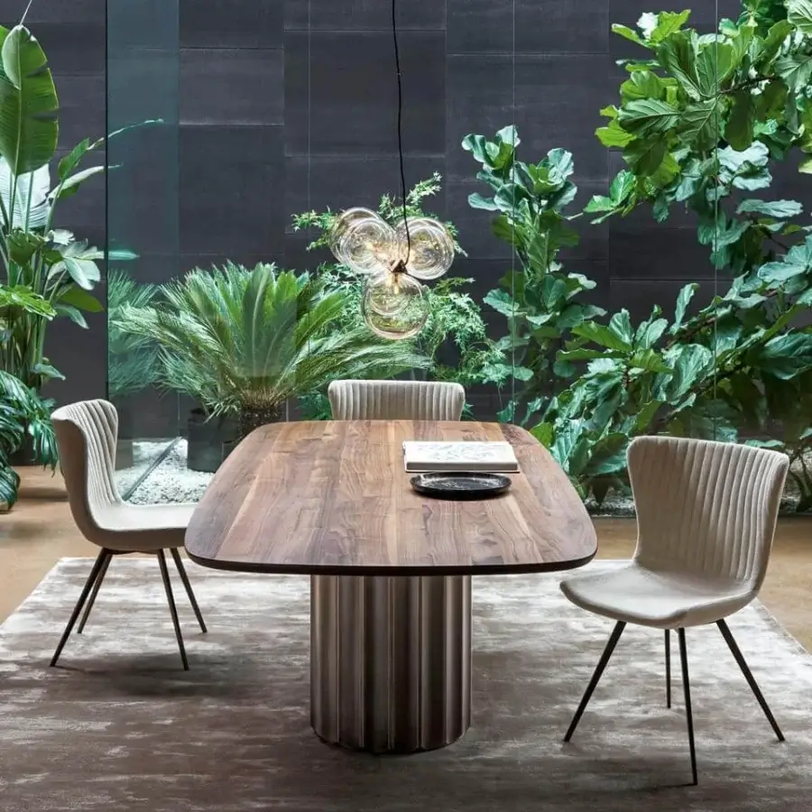 Distinguished Bonaldo Dorian table with ceramic top and sculptural base crafted in muted bronze or gray satin finish