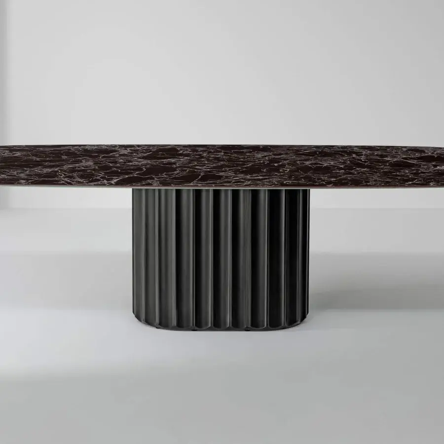 Exceptional Bonaldo Dorian table with dark marble-effect ceramic top and sculptural grooved cylindrical base crafted in a matte finish