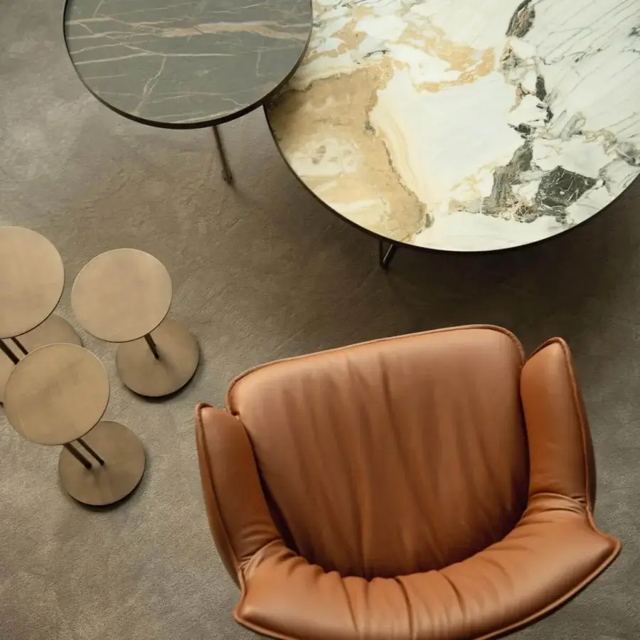 Superior Cattelan Italia Rhonda lounge chair in comfortable brown leather with a low dark base
