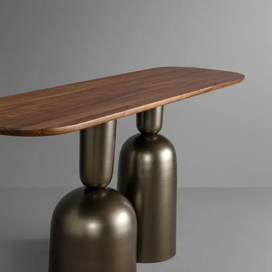 Elegant Bonaldo Cop console with wooden tabletop and bronze-toned inverted champagne flute metal pedestals