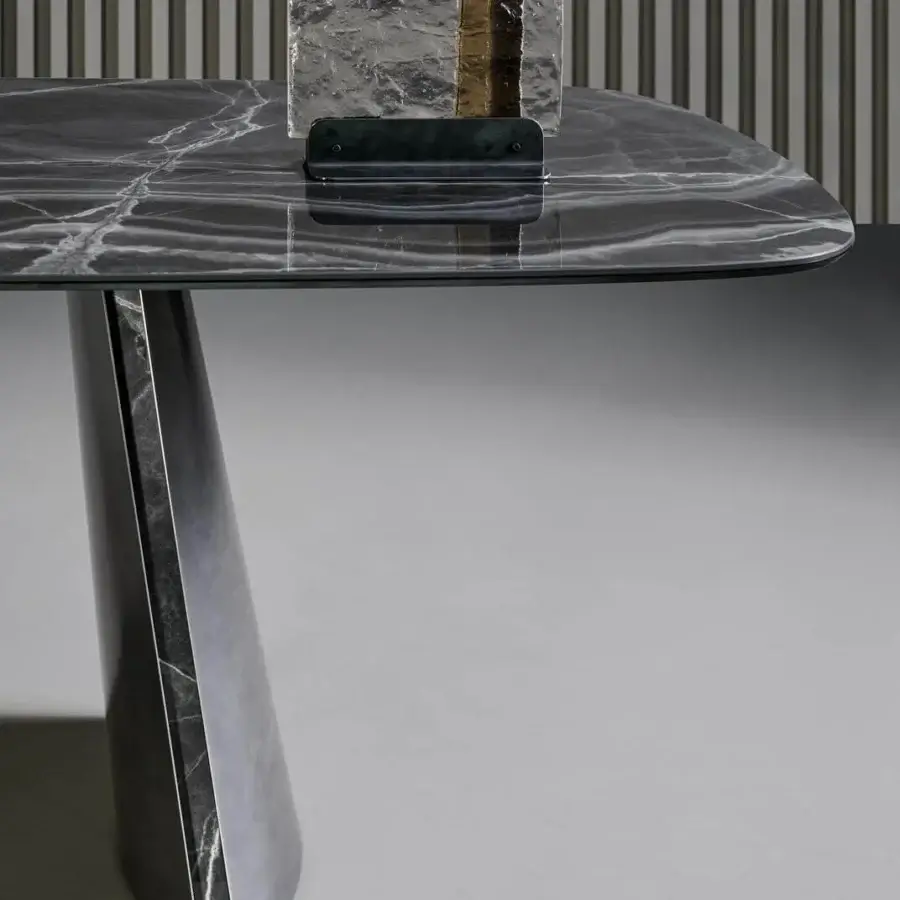 Elegant Bonaldo Torii table with dark marble top and inclined metal base crafted in matching finish