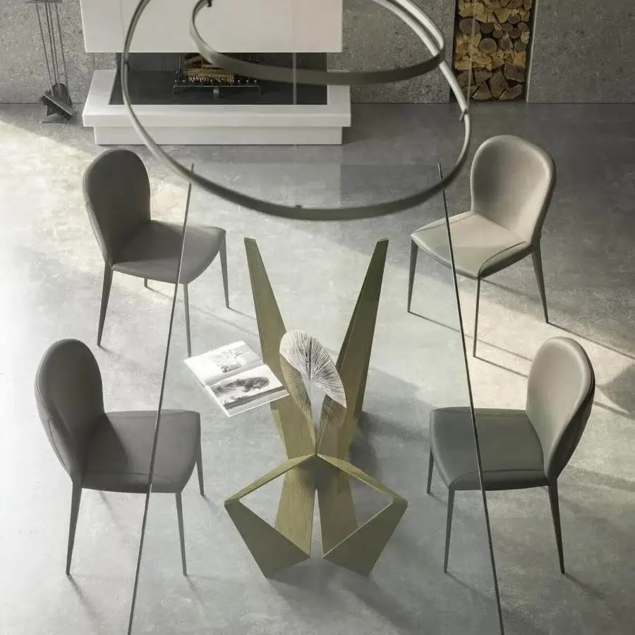 Superior Cattelan Italia Nancy chair with curved form fully upholstered in medium gray textile with matte metal legs