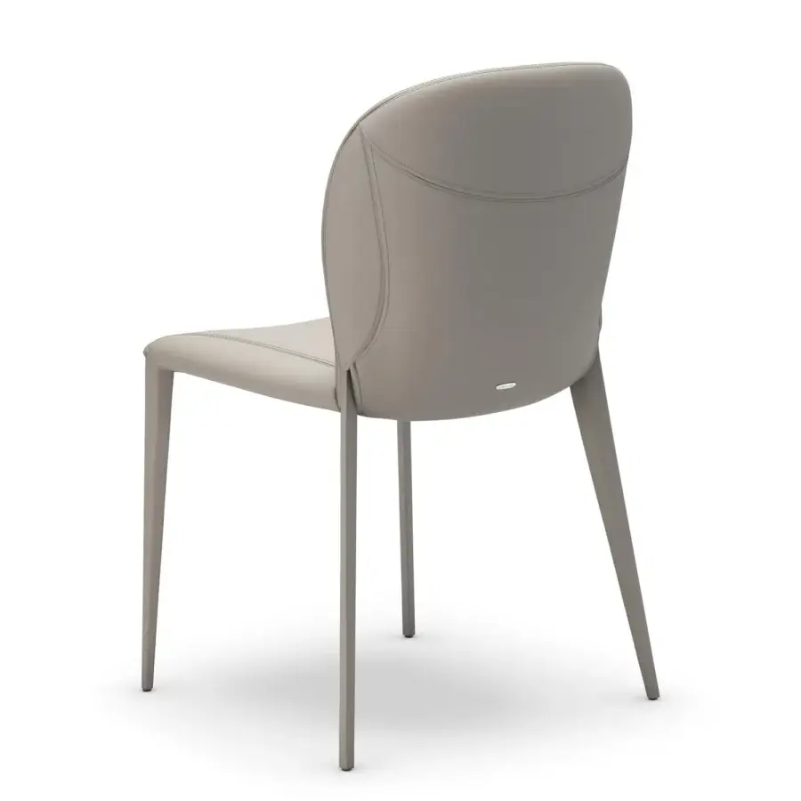 Exclusive Cattelan Italia Nancy chair fully upholstered in light gray smooth synthetic material with sinuous form and matching stitching