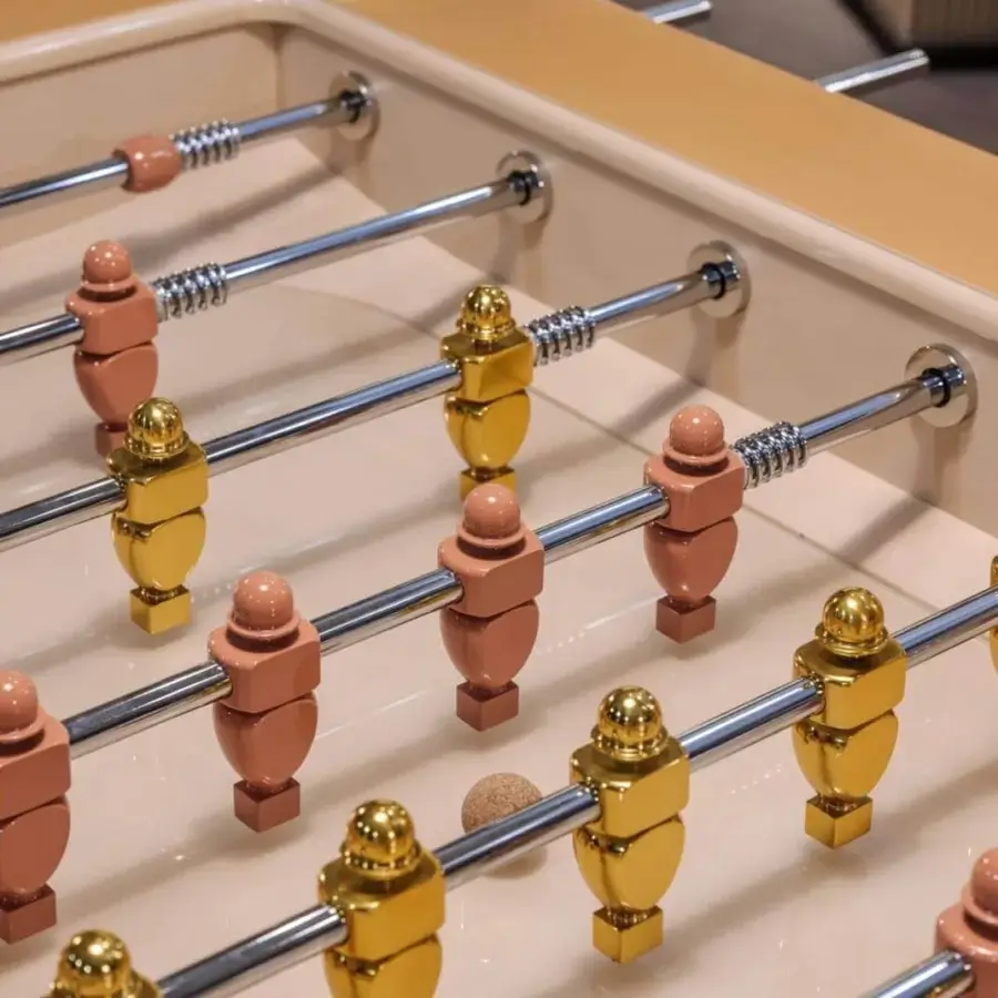 Distinguished Vismara Oskar foosball table with light tan lacquered structure and extra light lacquered tempered glass playing field
